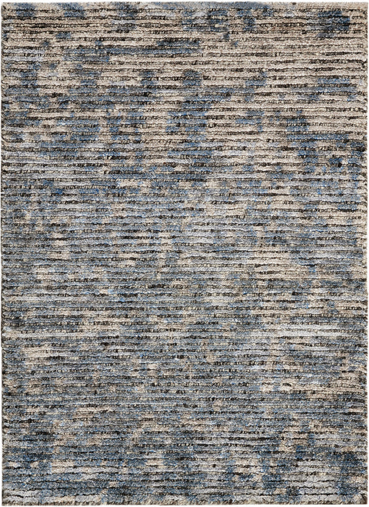 Blue & beige distressed area rug with abstract pattern; low-pile, versatile for living room or bedroom.