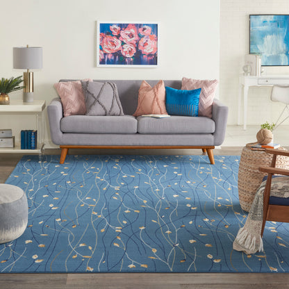 Gray contemporary rug in a bright living room, 9' x 12'.