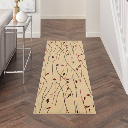 Beige hallway runner rug with red, blue and black curved lines and small leaf motifs; modern abstract design.