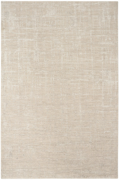 Beige rectangular area rug with a subtle distressed grid pattern and soft creamy tones.