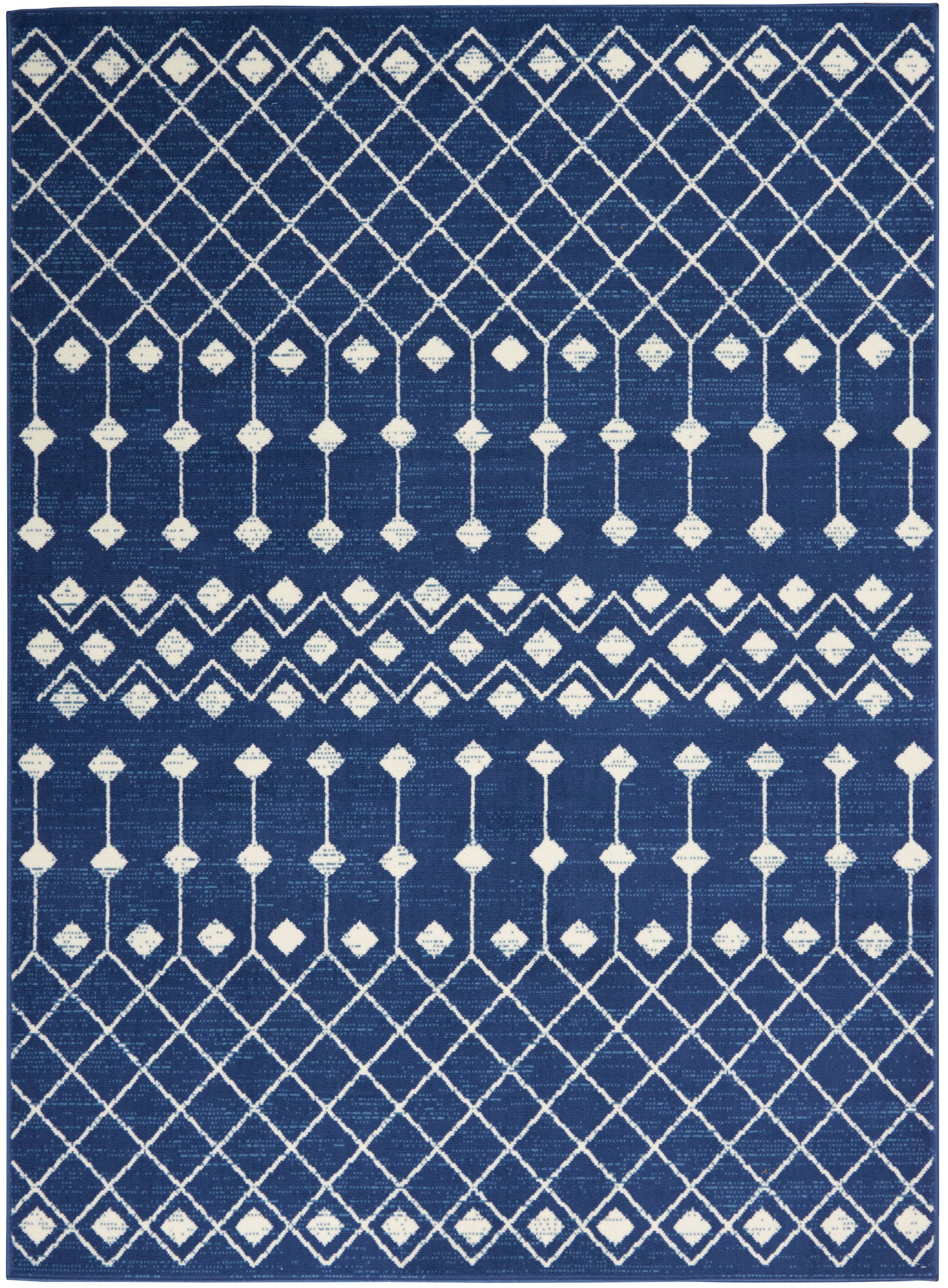 Navy blue area rug (4' x 6') with white geometric lattice and diamond pattern, featuring symmetrical horizontal bands.
