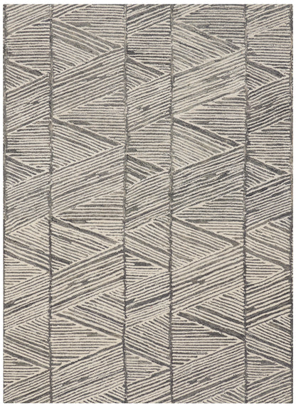 Rectangular area rug in beige and gray with a geometric chevron pattern and textured woven surface.