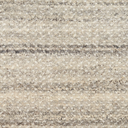 Beige and taupe striped loop-pile carpet close-up with a textured surface.