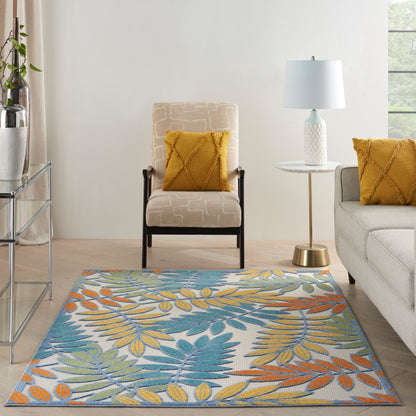 Tropical leaf rug in teal, blue, yellow & orange (5' x 8').
