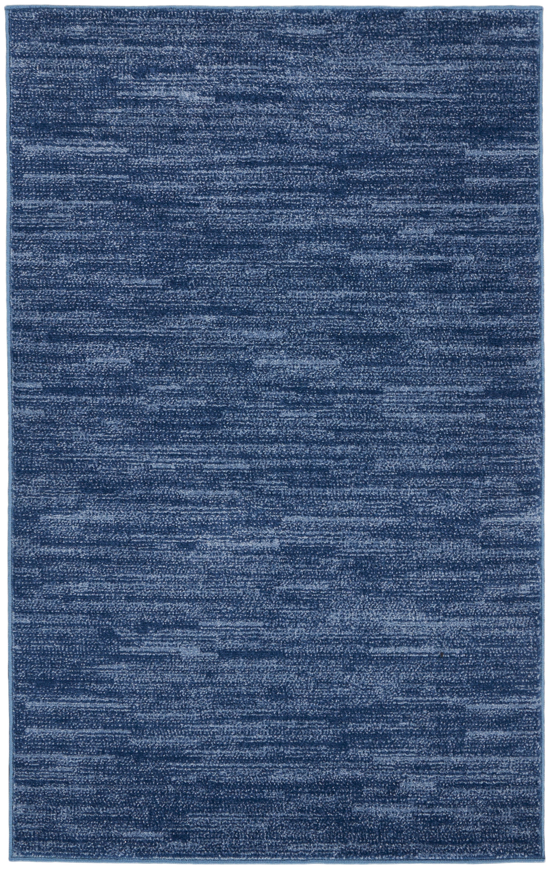 Blue rectangular outdoor rug with a heathered, textured surface in variegated dark & medium blues, 3' x 5'.