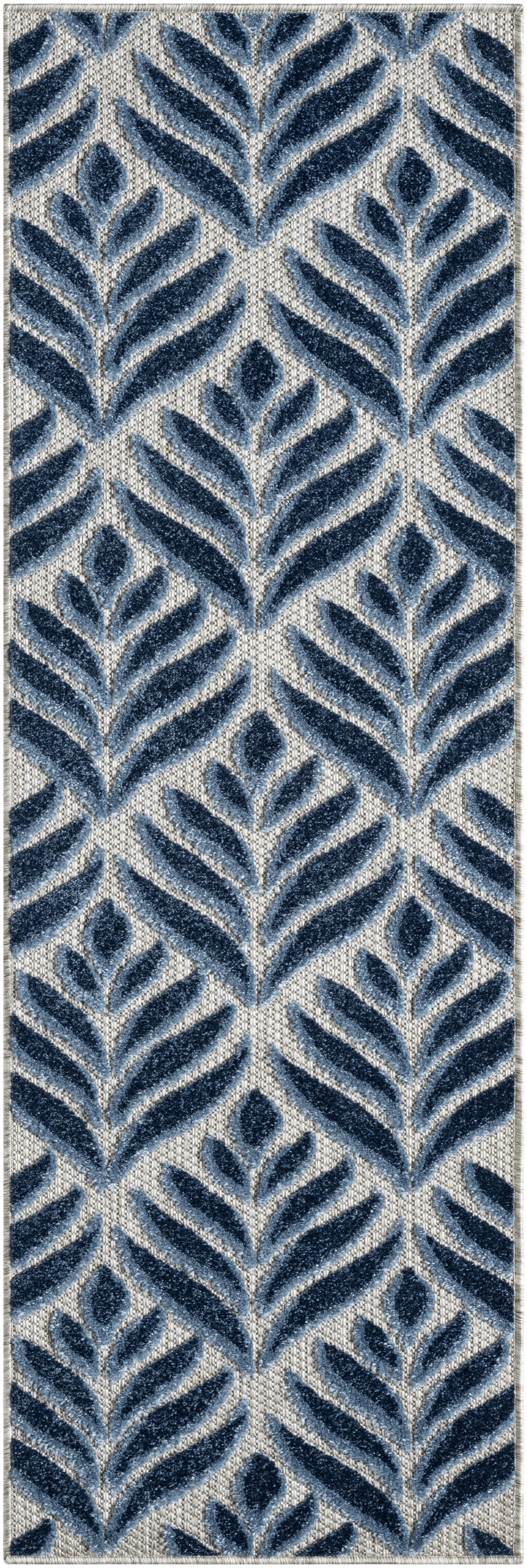 Long hallway rug runner with navy blue fern-leaf pattern on cream-beige textured background.