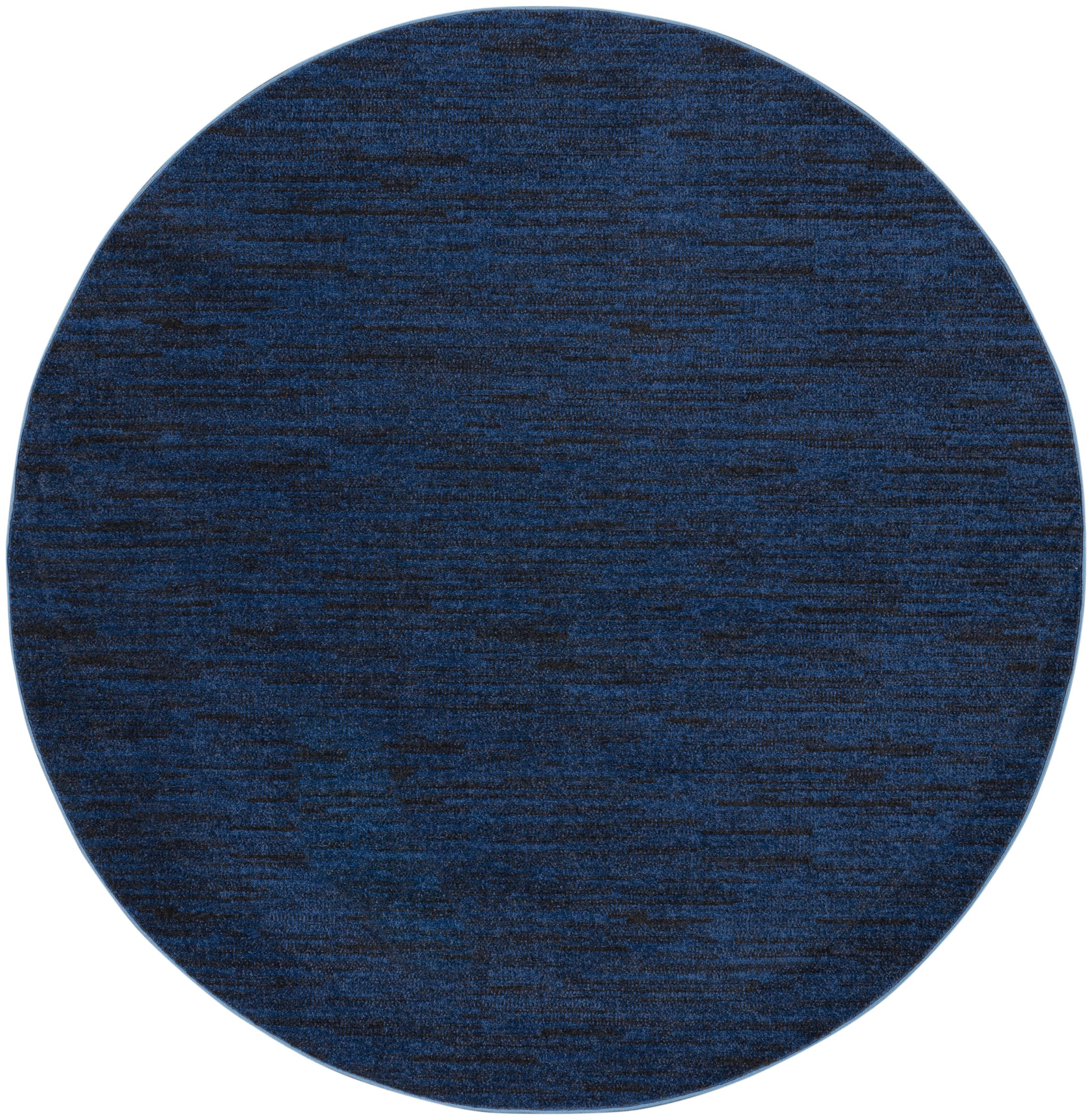 Dark blue round rug with heathered texture, soft woven fabric for living room or bedroom.