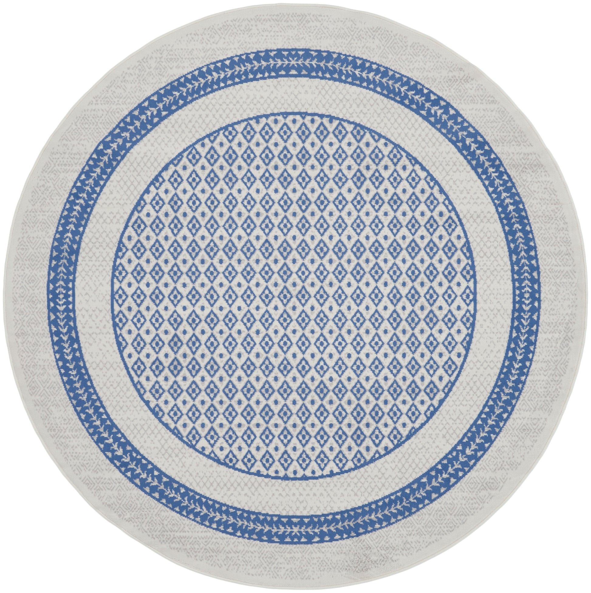 Round rug with blue diamond lattice center and double blue border on white background.