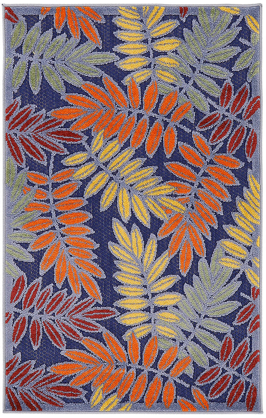 Navy blue rug featuring vibrant orange, yellow, red and sage-green palm leaf pattern.