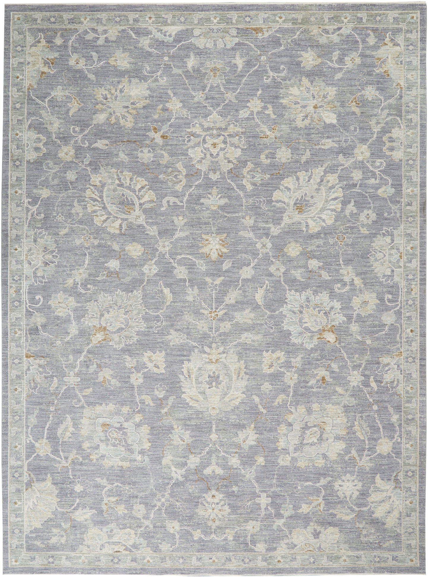 Blue-gray traditional floral area rug with ivory and beige blossoms; bordered, soft pile.