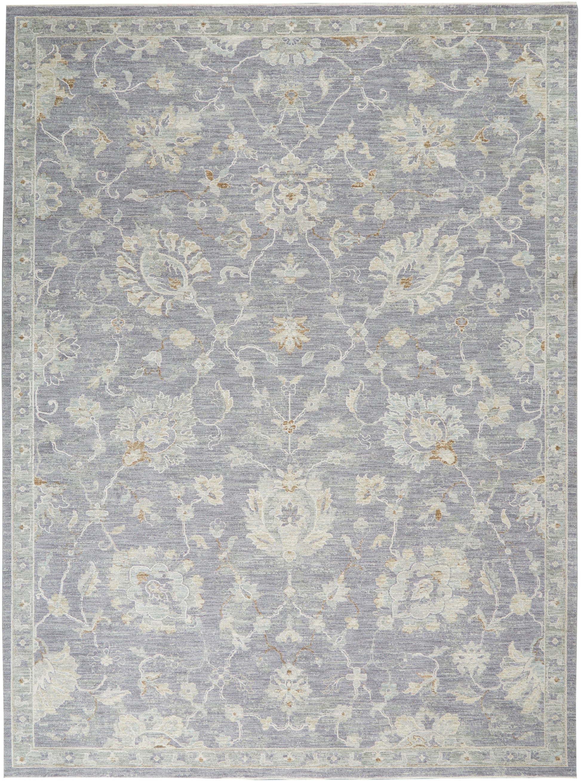 Blue-gray traditional floral area rug with ivory and beige blossoms; bordered, soft pile.