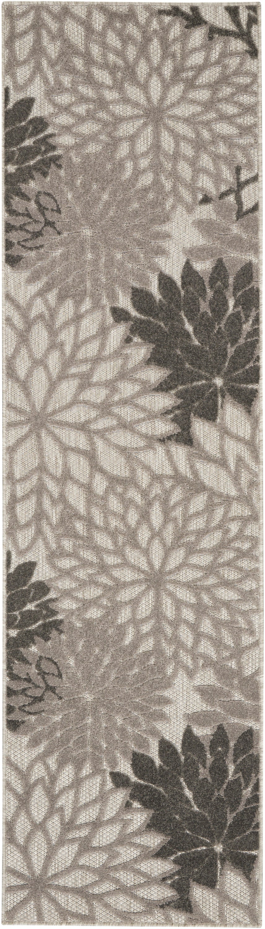 Beige woven rug featuring large taupe-gray chrysanthemum flower motifs for floor decor