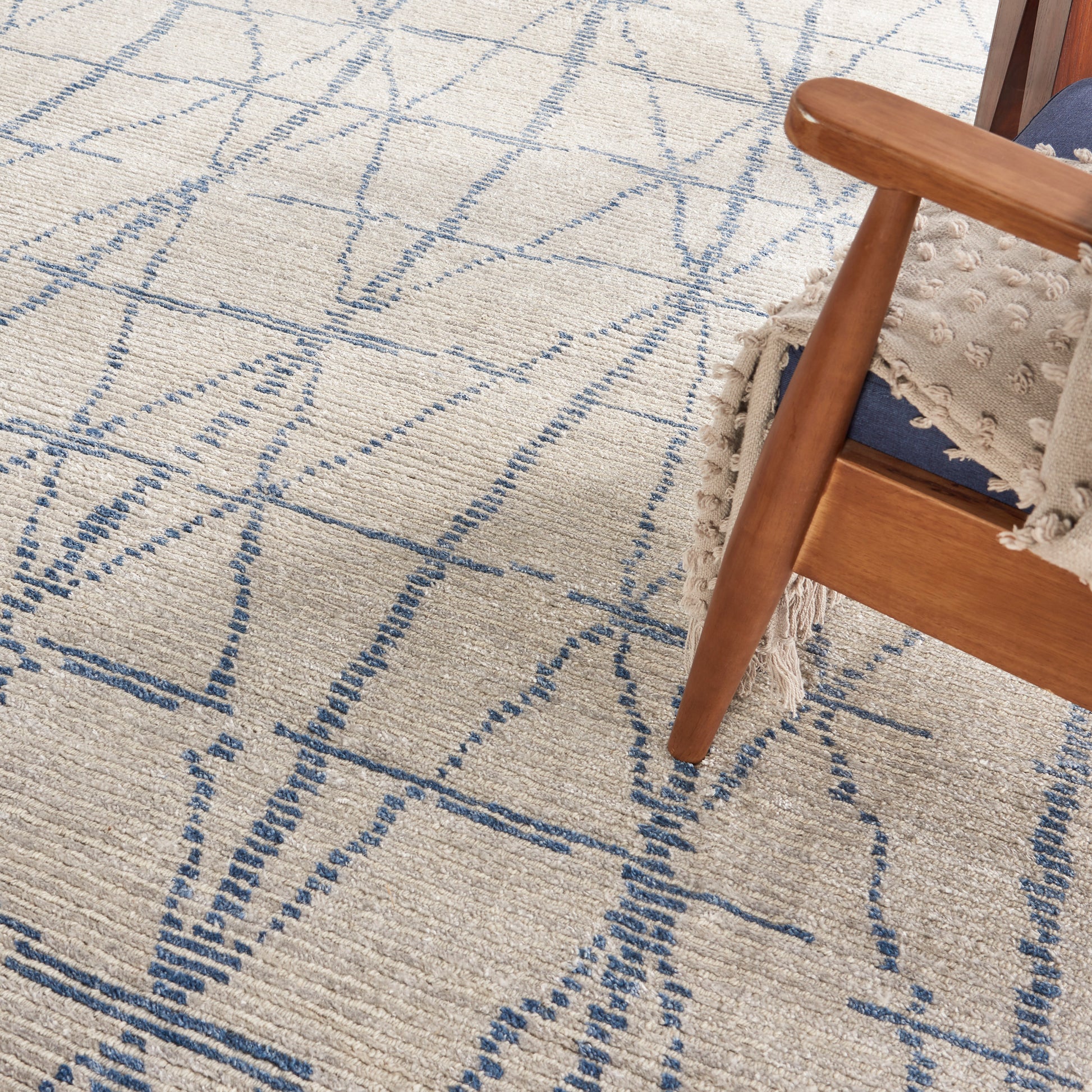 Nourison Ellora 8' x 10' hand-knotted area rug from Primoends with neutral abstract design, wool and rayon blend, modern indoor rug for living room, bedroom, or dining room décor.