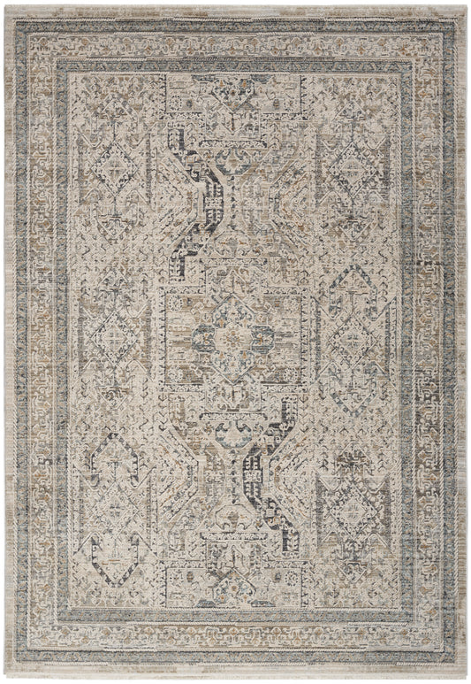 Rectangular distressed Persian-style area rug in ivory, beige and blue-gray with intricate medallions and ornate borders.