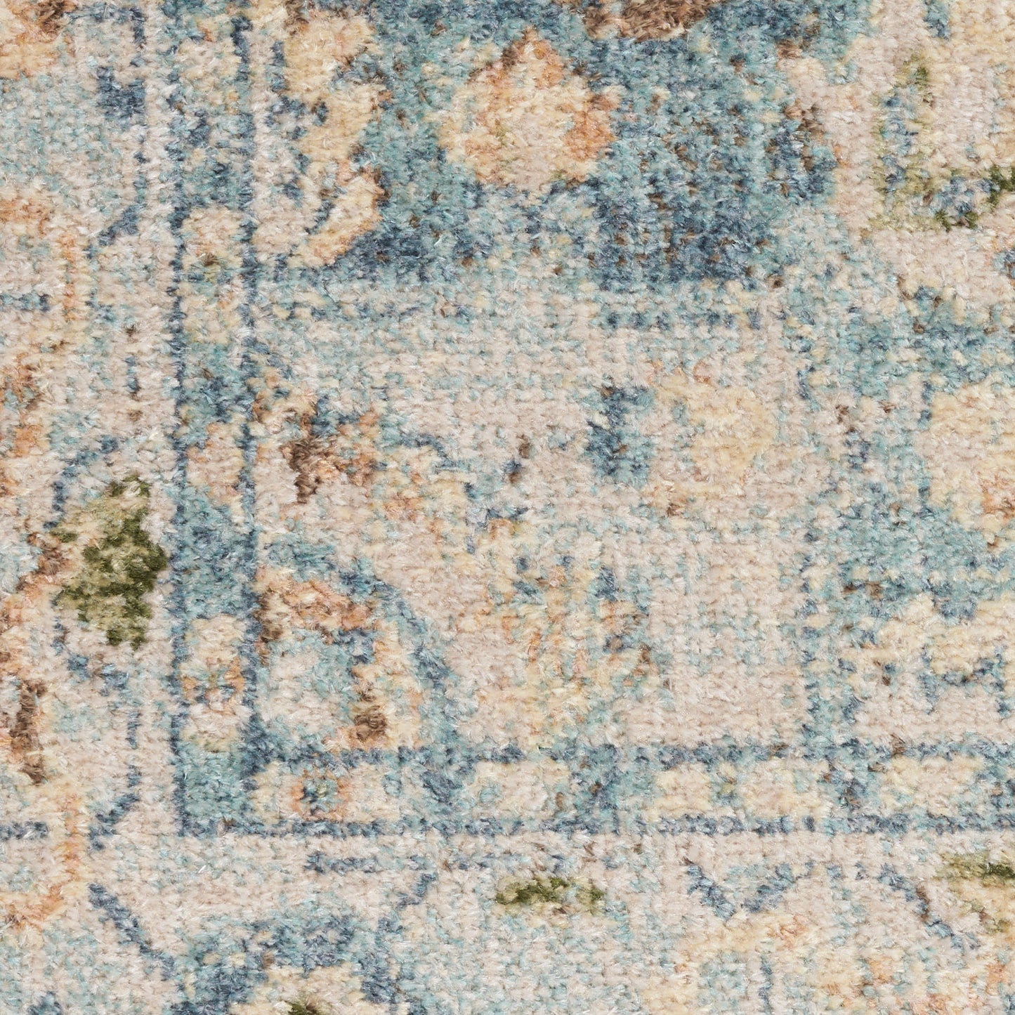 Distressed blue & ivory floral-pattern area rug with teal accents, soft pile, rectangular for living spaces.