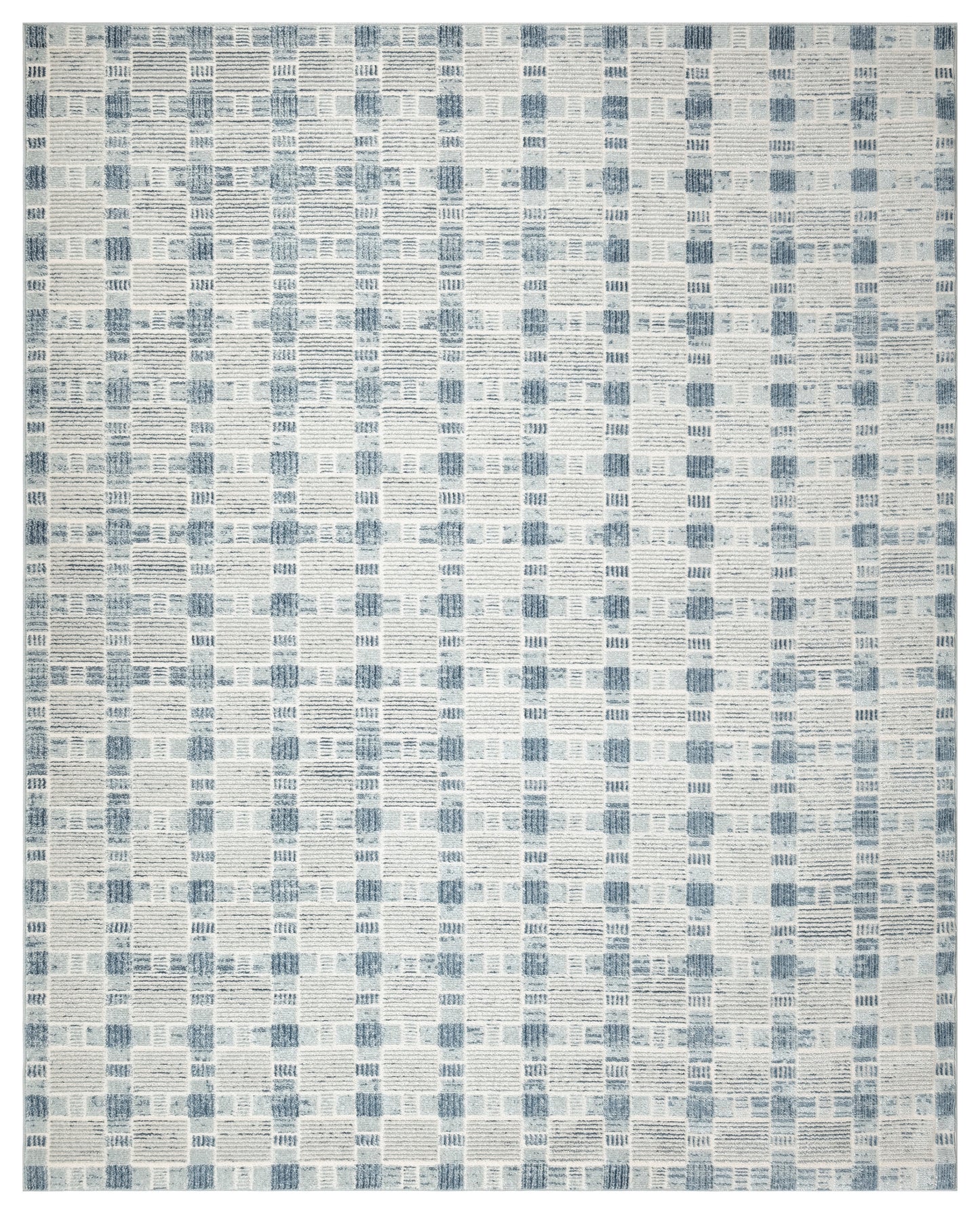 Blue and cream patchwork rug with a geometric grid of small rectangular blocks.