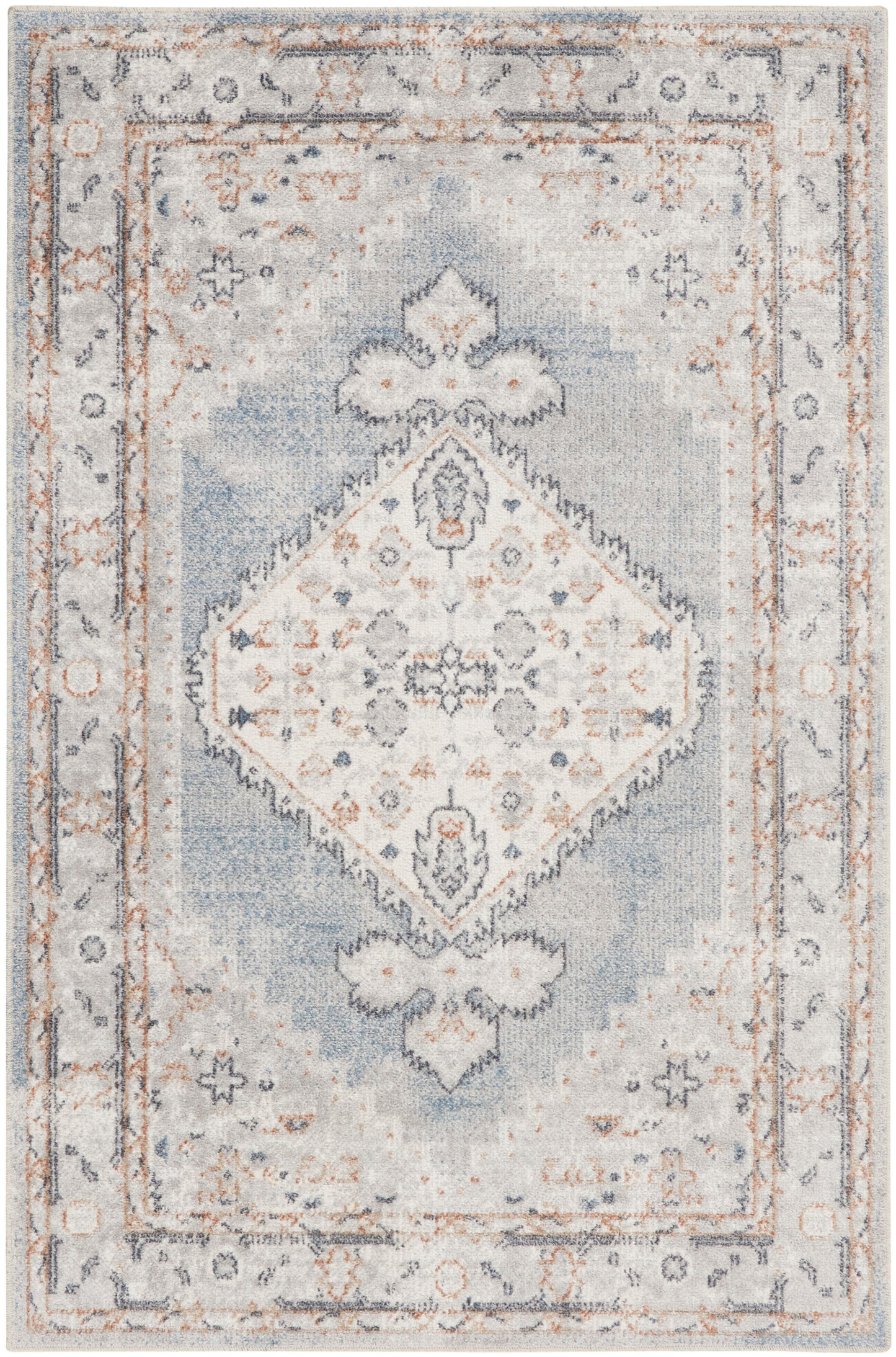 Rectangular vintage-inspired area rug in pale blue and ivory with a central diamond medallion and distressed border