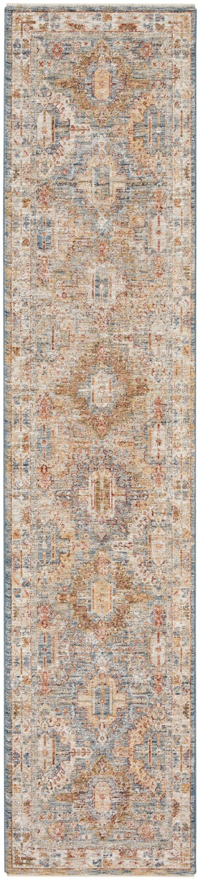 Distressed oriental runner rug in muted blue, ivory and rust with repeating medallion border motifs.