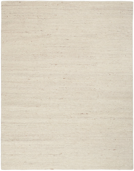 Neutral beige woven rug with speckled texture; soft, natural fibers, rectangular area rug for living room.
