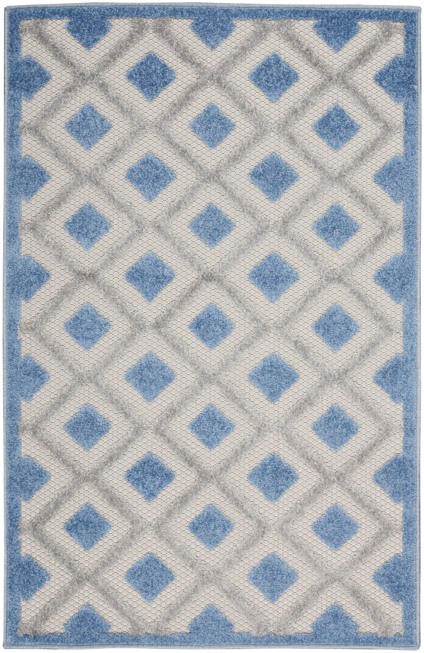 Blue and ivory geometric area rug with diamond lattice pattern and blue border; plush pile.