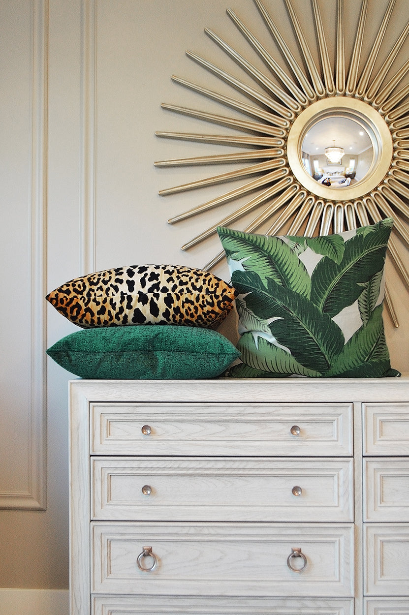 Leopard print animal pillow, 24 x 24 inches.