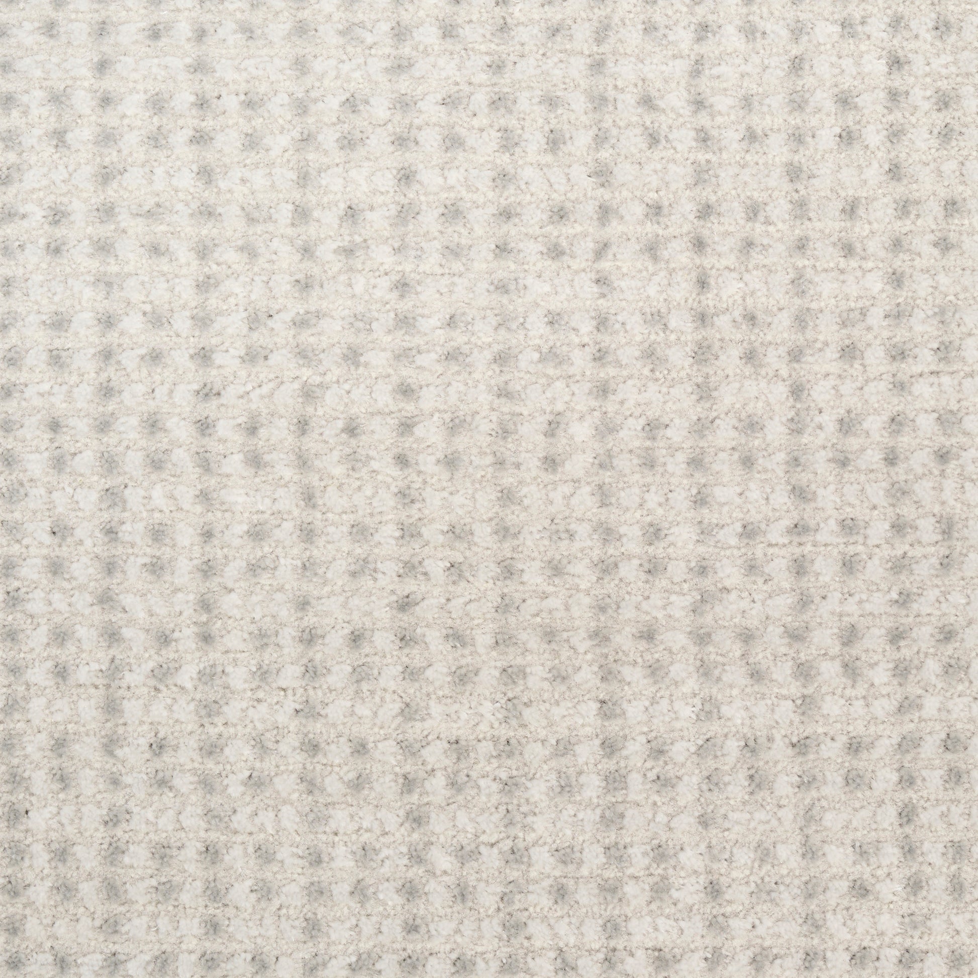 Beige waffle-knit fabric close-up with small square texture, soft thermal look, ideal for towels or blankets.