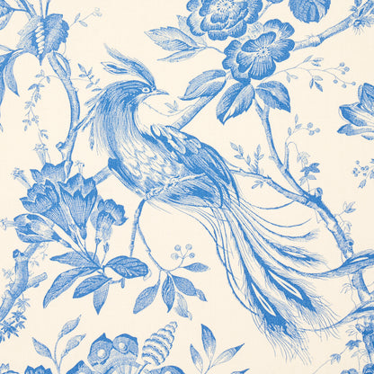 Blue ink botanical print featuring a birds-of-paradise bird perched on flowering branches with leaves.