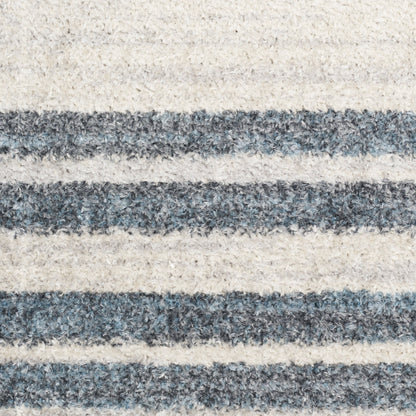 Cream and navy striped shag rug with plush, textured pile; rectangular coastal-style floor decor.
