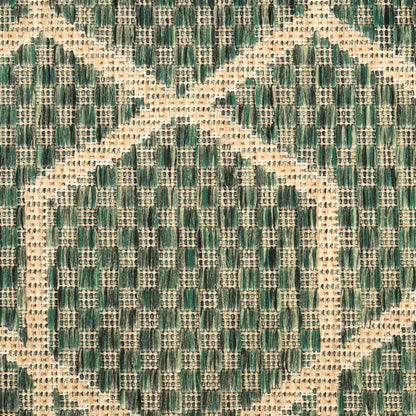 Green and beige woven geometric rug fabric with diamond pattern, textured and durable for upholstery.