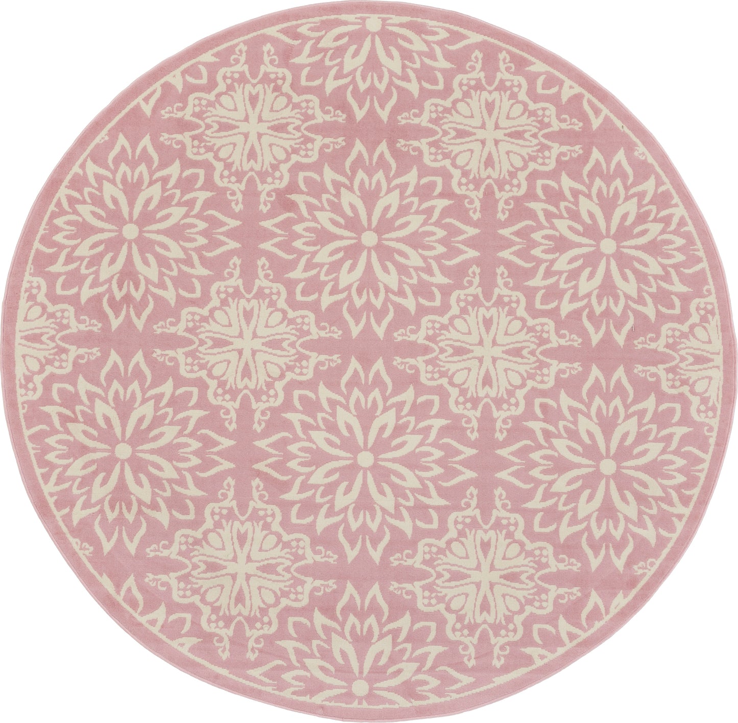 Round pink rug with ivory ornate medallion motifs; plush textile for living room or bedroom.