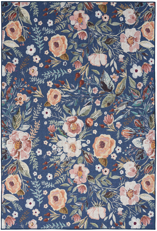Rectangular navy blue floral rug with peach, pink and white flowers and green leaves in a lush botanical pattern.