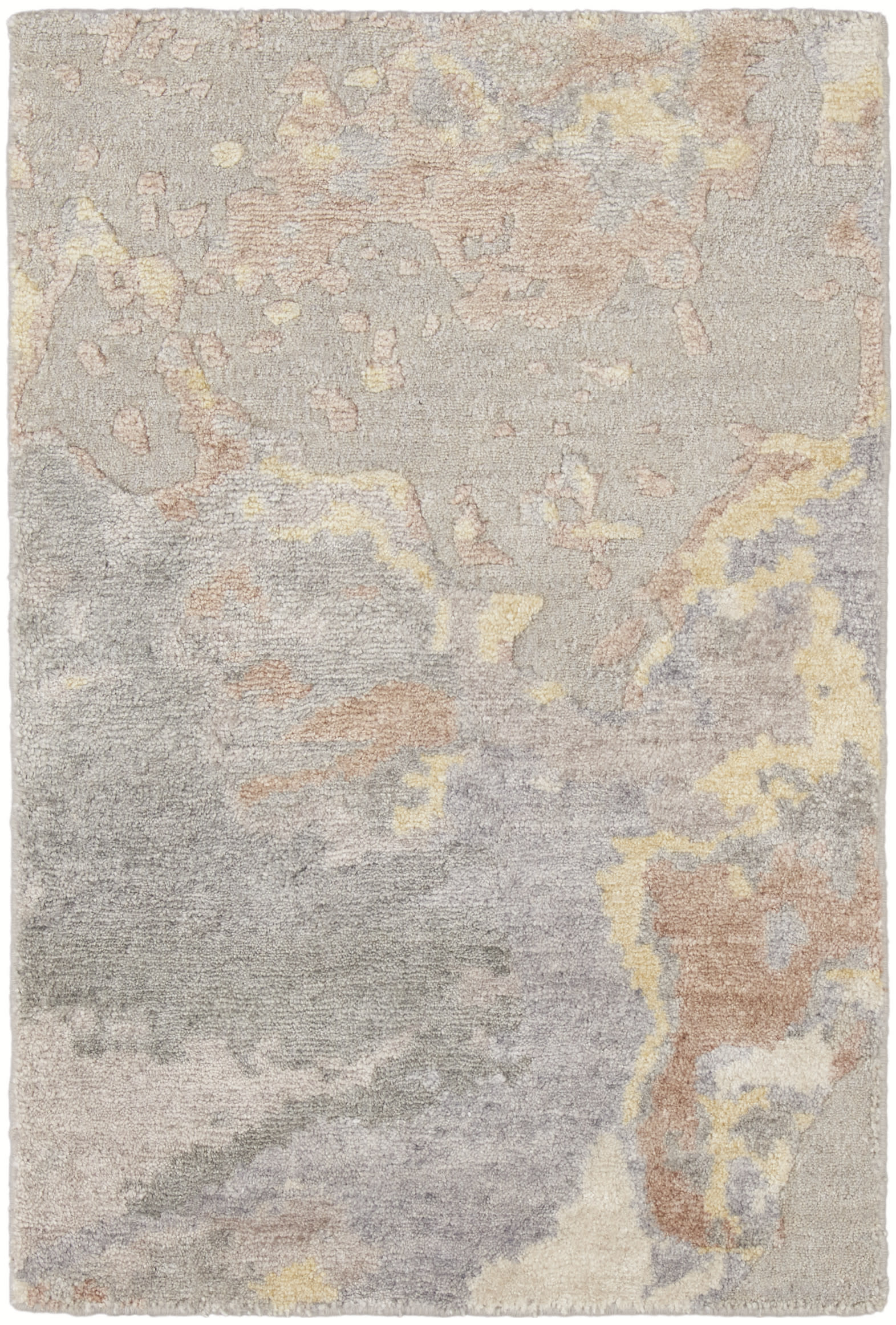 Soft abstract pastel area rug with muted gray, blush pink, lavender & pale yellow blotches in a plush shag texture.