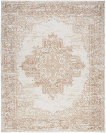 Beige distressed rug with ivory center medallion and ornate border in a vintage Persian-inspired design.