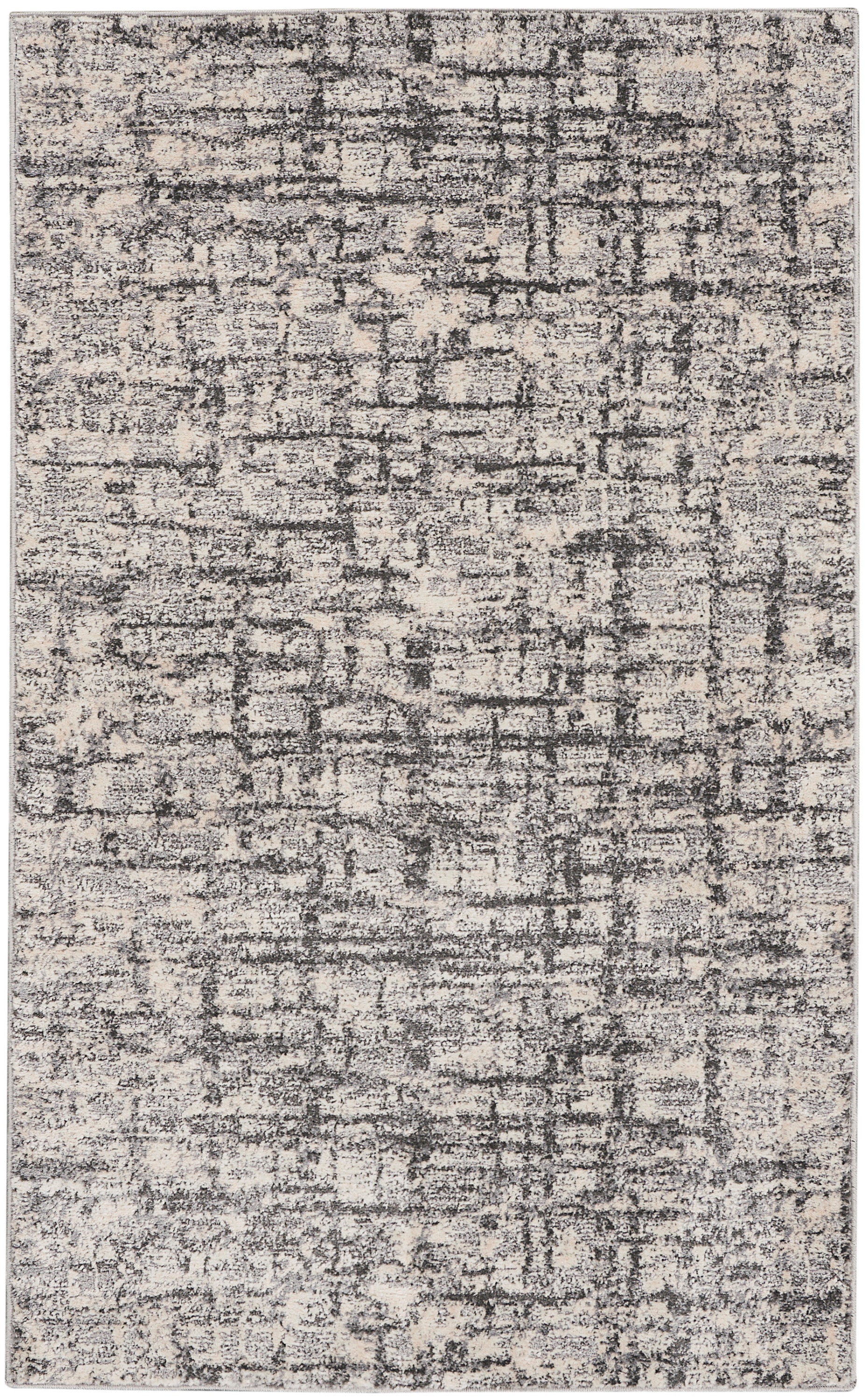 Rectangular area rug with beige & charcoal distressed abstract pattern; soft, low-pile, modern contemporary style.