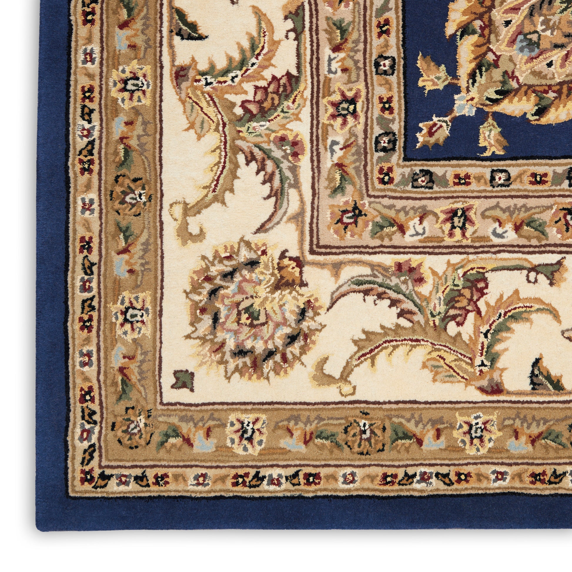 Persian-style rug with navy outer border, cream field, and ornate floral motifs surrounding a blue center.
