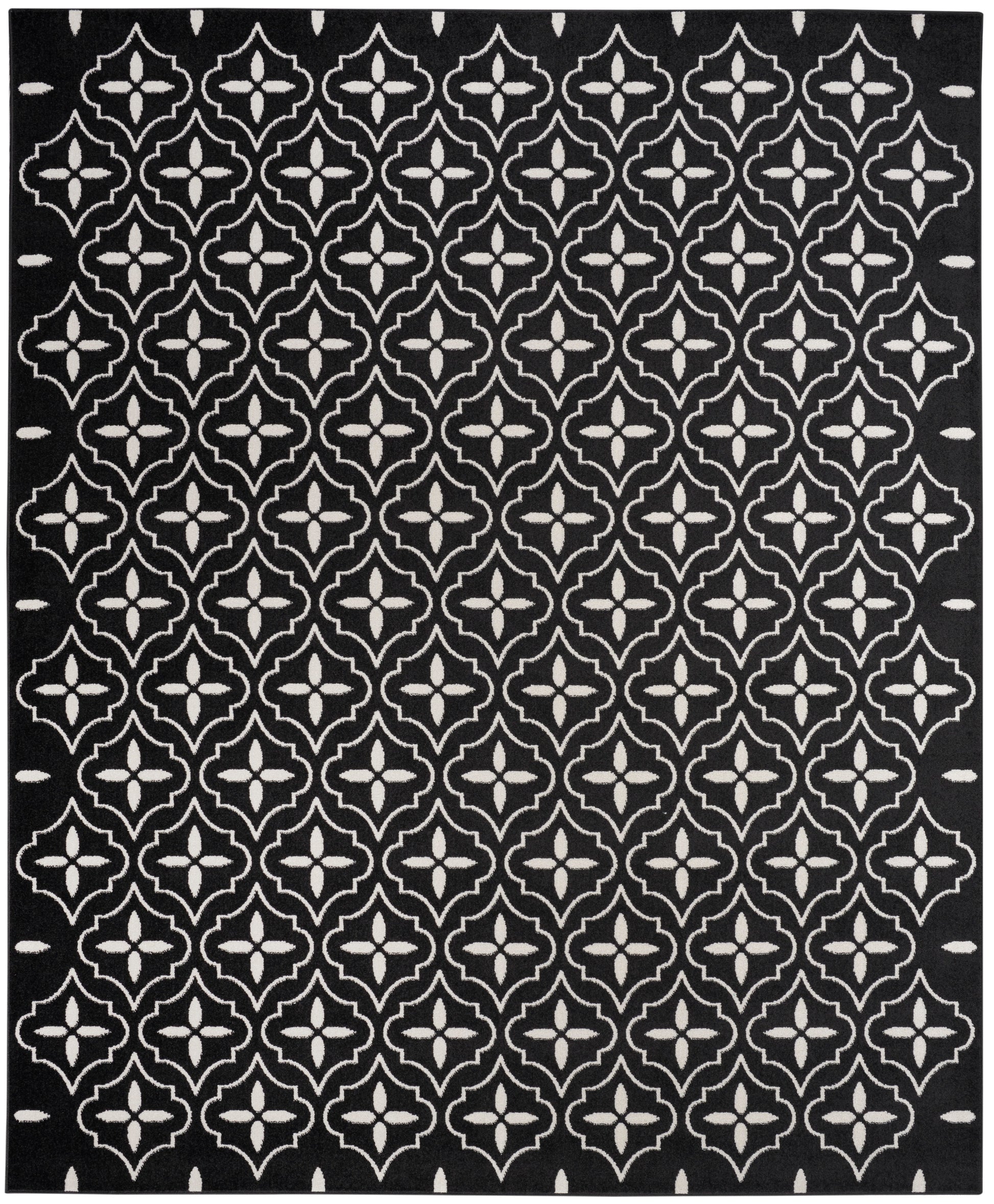 Black rectangular rug with a white Moroccan trellis quatrefoil repeating pattern for a modern geometric look.