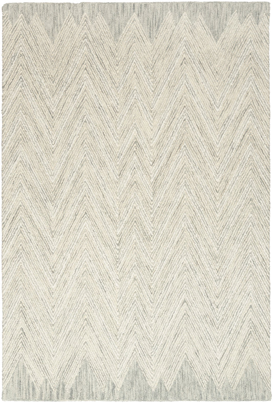 Neutral gray chevron rug with a textured pile and ivory-gray zigzag pattern.