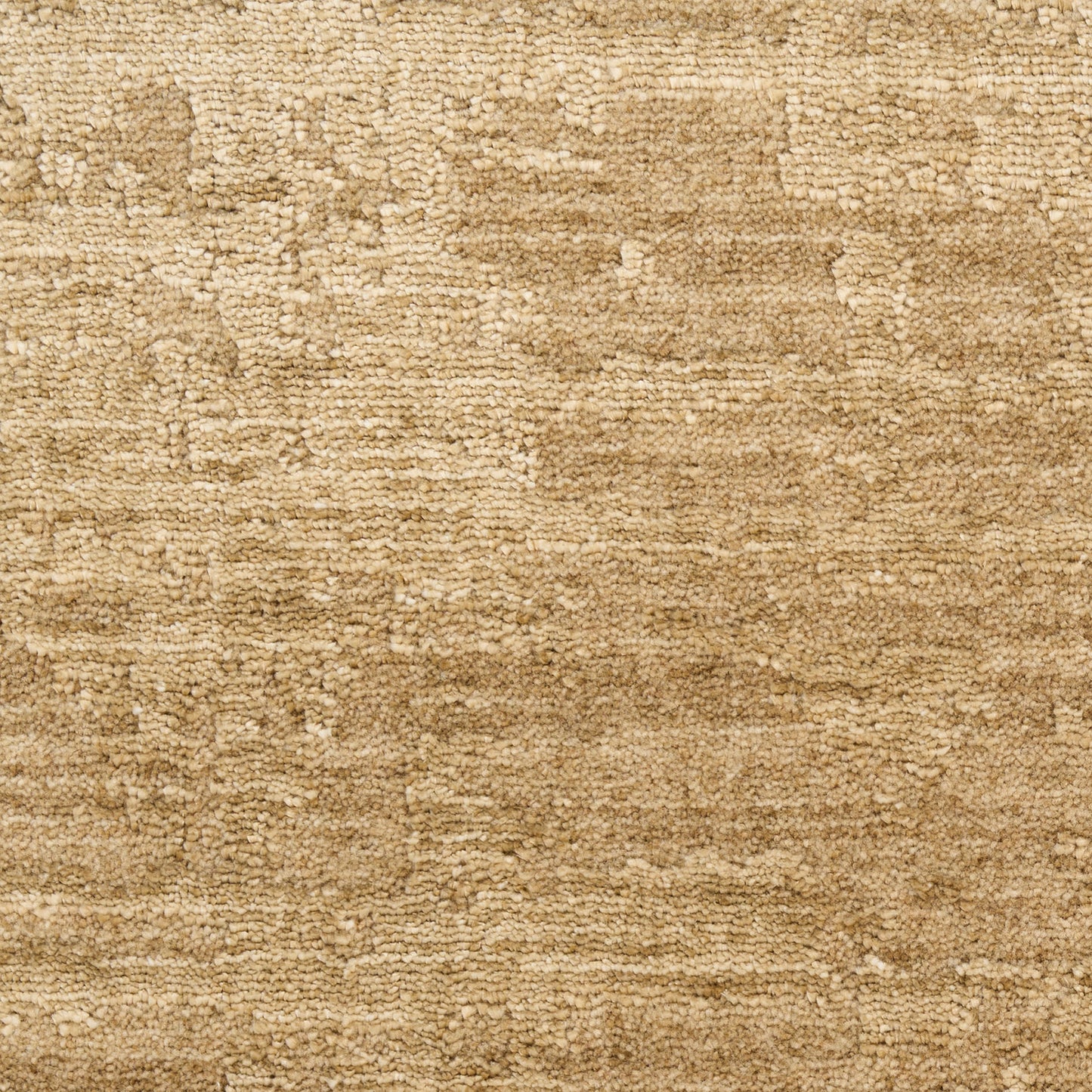 Beige-toned textured area rug with a subtle abstract pattern and soft pile, neutral warm decor for living spaces.