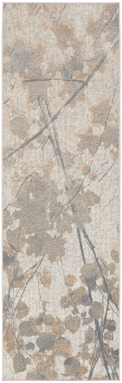 Neutral abstract floral area rug with beige, taupe and gray shapes and blue-gray stems; rectangular, soft textured.