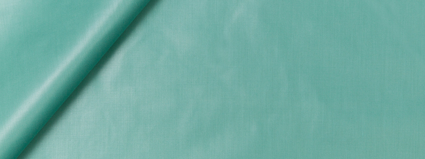 Turquoise fabric swatch with a soft sheen and diagonal fold.