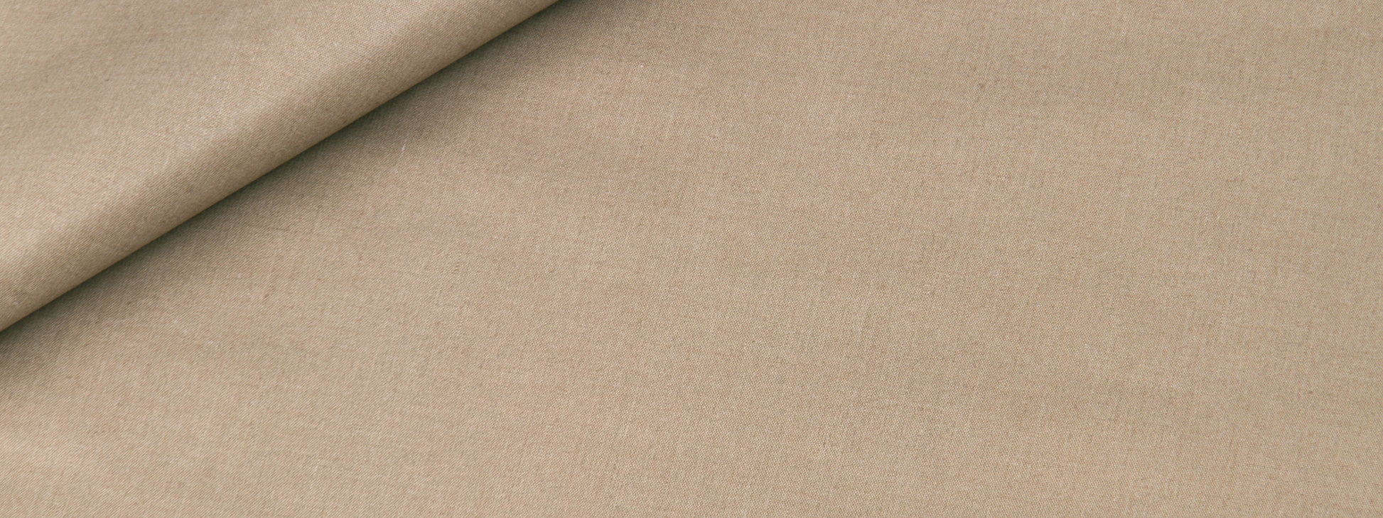 Beige linen-like fabric with a folded corner; smooth, matte textile ideal for upholstery or crafts.