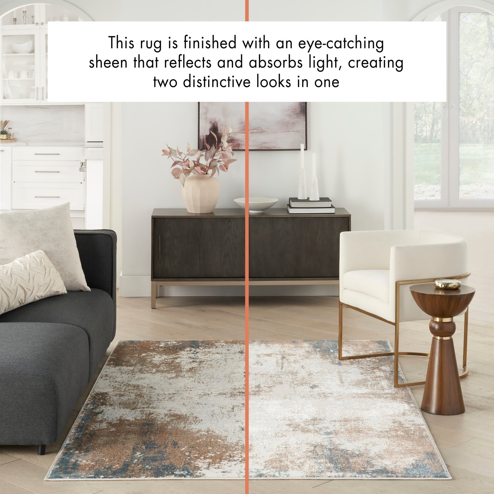 Contemporary living room with a distressed blue and beige area rug, dark sofa, white armchair, and wood side tables.