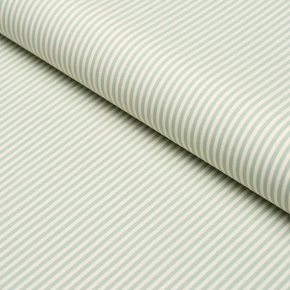 Aqua and white diagonal striped poplin fabric roll, close-up view.