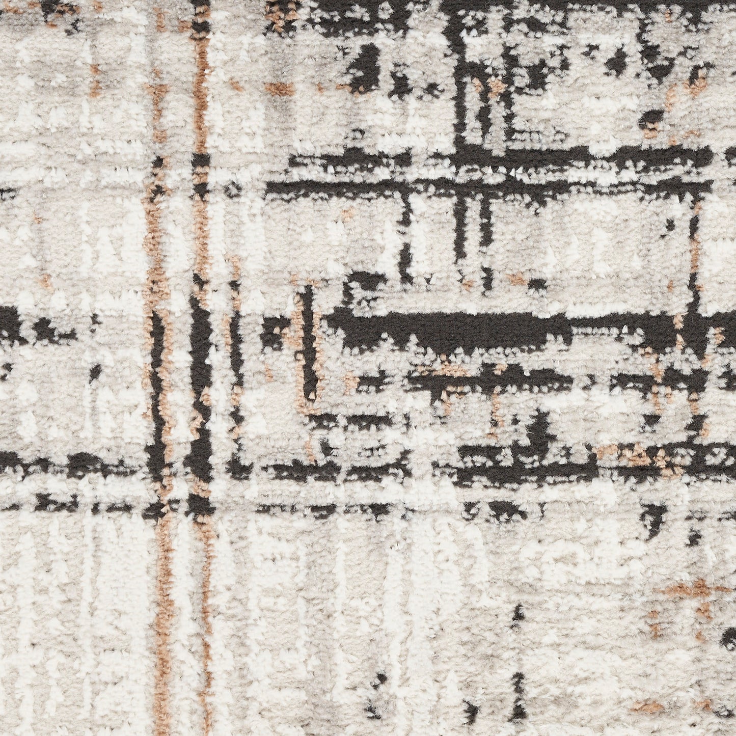 Cream shag rug with black and rust abstract lines, soft high-pile texture and modern pattern.