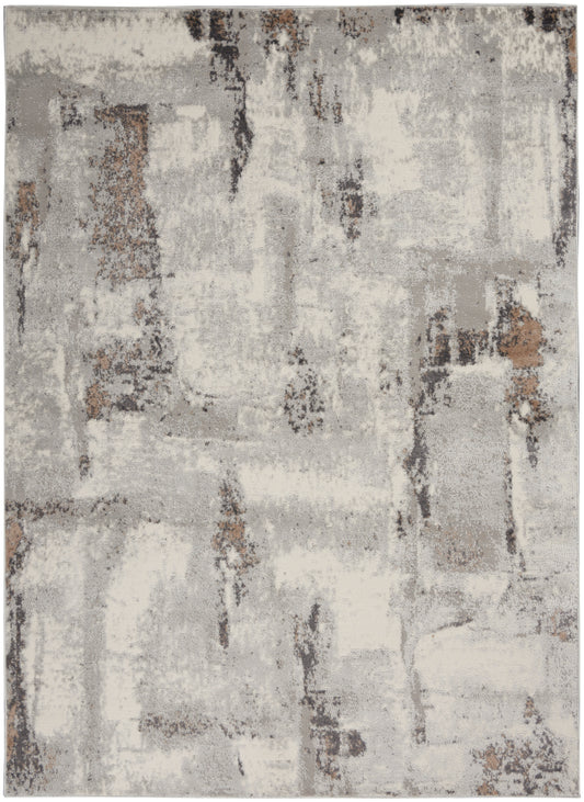 Abstract gray and ivory distressed rug with taupe and brown accents, modern soft-textured area rug.
