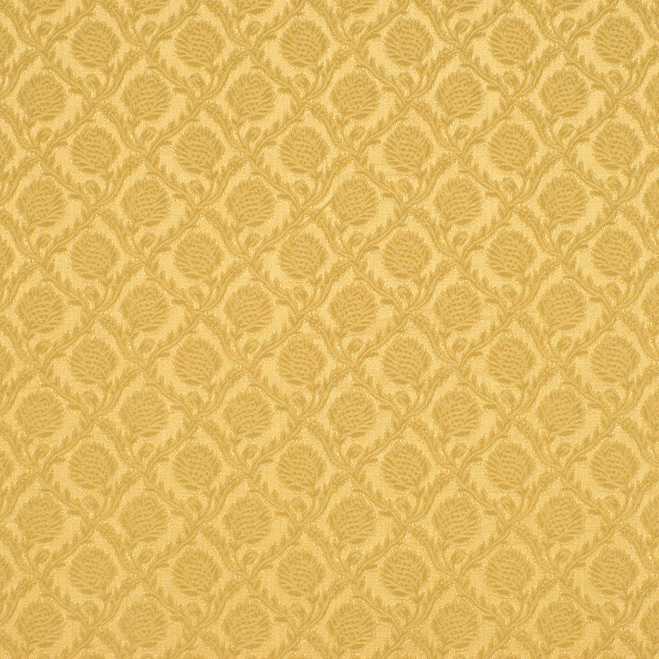 Golden damask-pattern upholstery fabric with ornate leaf motifs in a diamond grid.