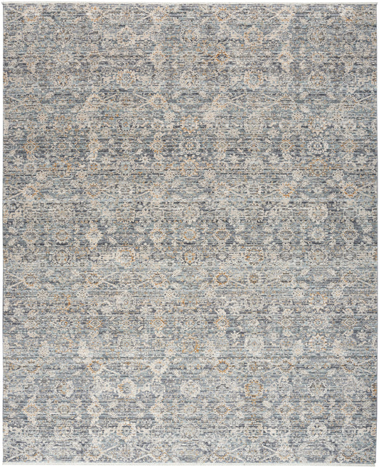 Blue-gray distressed oriental rug with cream & tan medallions, rectangular, traditional living room decor.