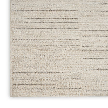 Beige runner rug with subtle horizontal stripes in muted gray-brown; low-pile, woven texture.