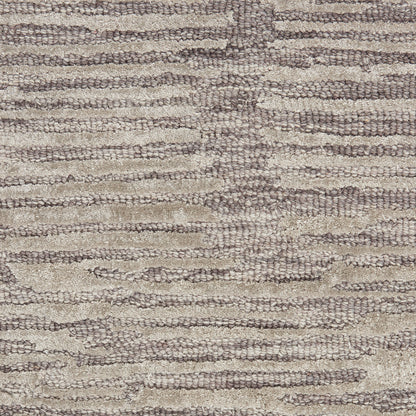 Neutral beige and taupe woven rug with looped texture and abstract horizontal striped pattern.