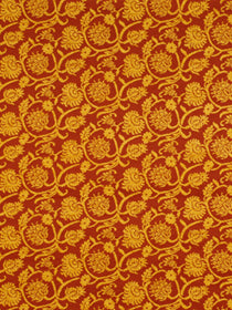 Gold damask floral pattern on red brocade upholstery fabric; ornate repeating medallions.